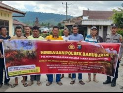 Polsek Barusjahe Himbau Warga dan Pasang Spanduk “STOP Pembakaran Hutan dan Lahan” di Desa Pertumbuken